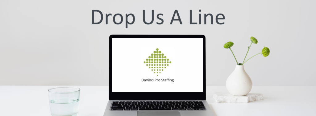 A laptop with the words " drop us a line ".